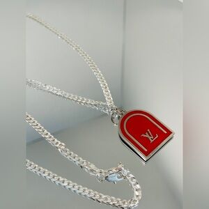 Authentic,LV Rare double sided enamel charm on Sterling silver